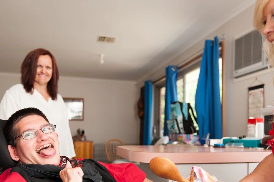A support worker assisting a participant